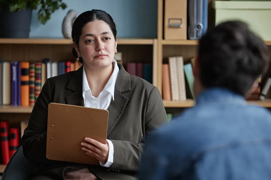 Counsellor listening to a student during a career counselling session