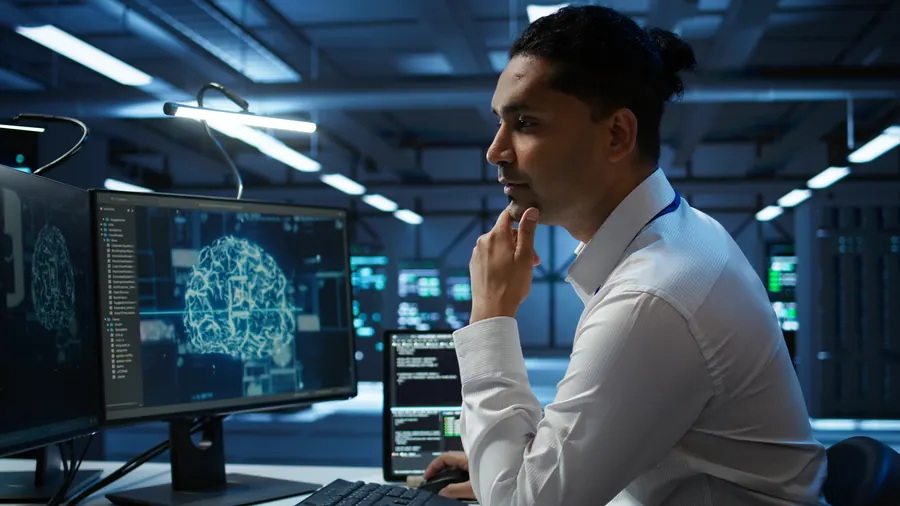 Colleagues inspecting a data centre used for machine learning