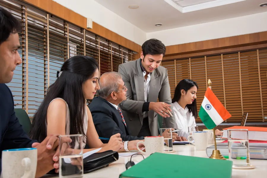 BULBON team collaborating in an office meeting