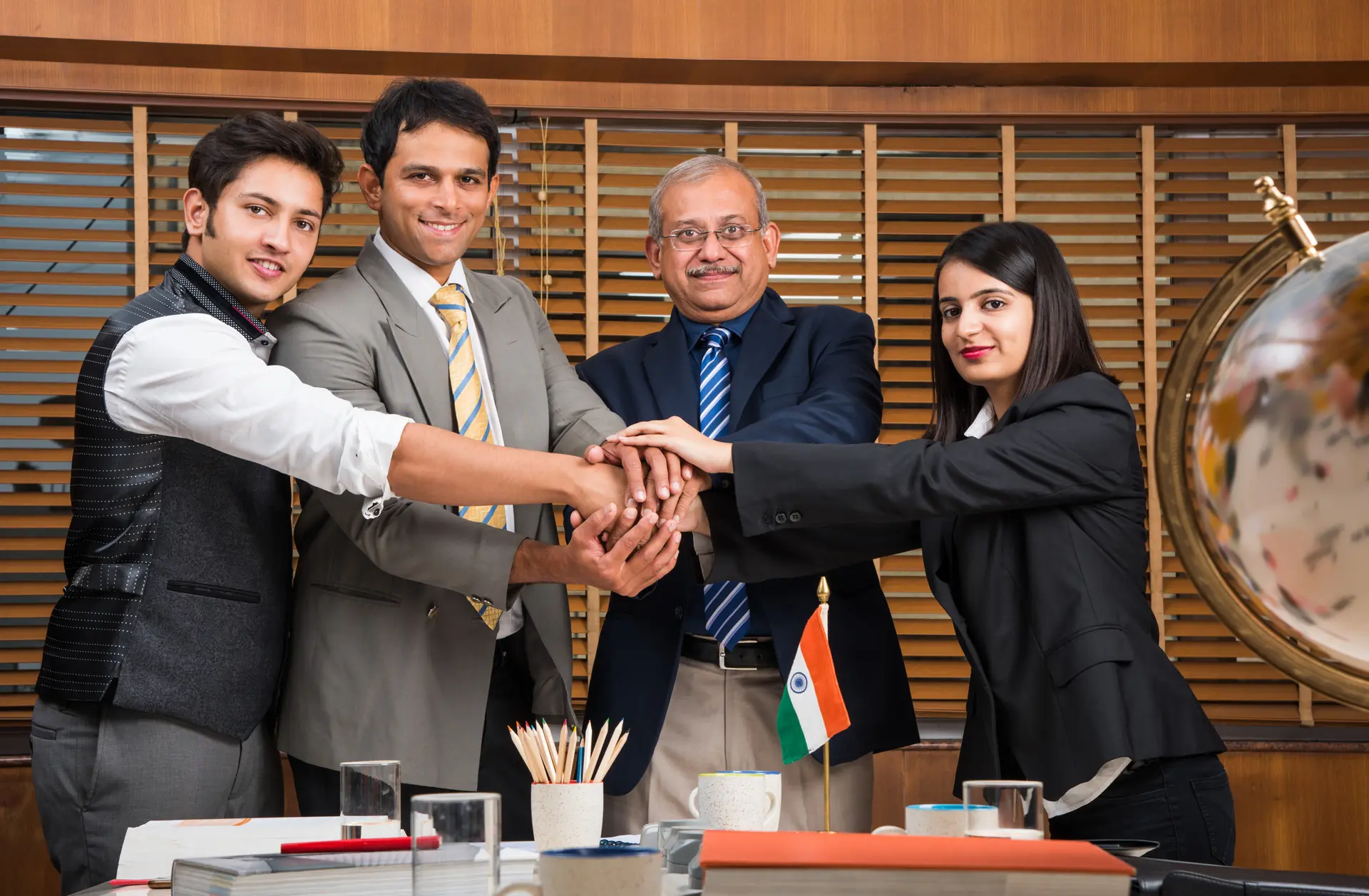 Indian professionals working together in a modern office