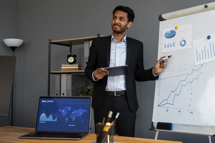 Founder reviewing finance and growth graphs