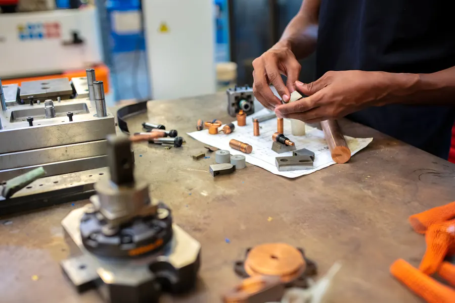Tool room worker assembling a new fixture