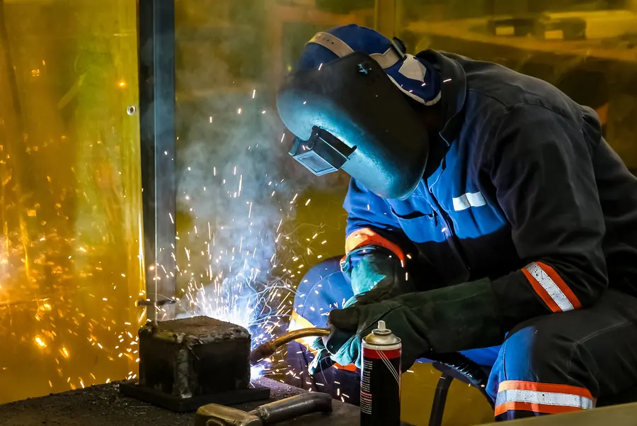 Trainee working with a welding torch